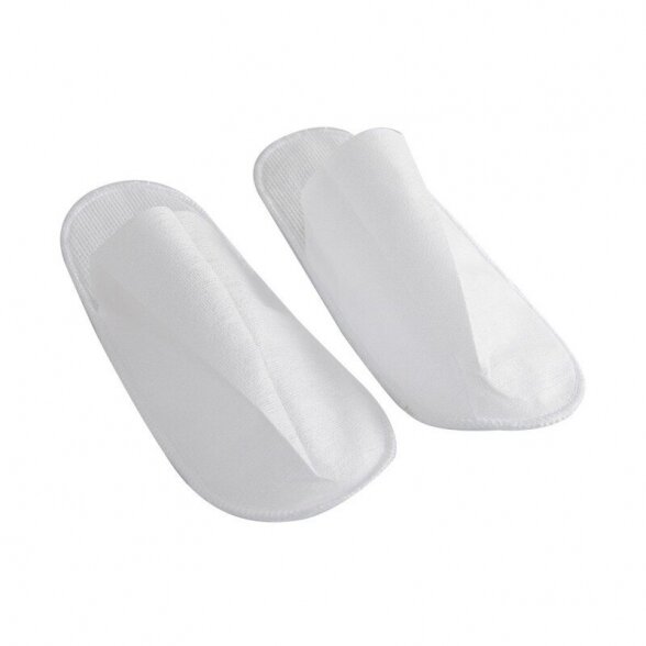 Disposable closed slippers, (non-woven material) white. 10 pairs.